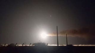Iranian navy fires a missile, at an unknown location, in this still image taken from a video released